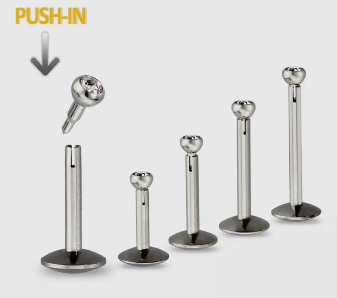 Sometimes the smallest details speak the loudest. This piece delivers a clean polished look with effortless confidence. Designed with a smooth finish and a comfortable flat back style blending seamlessly into your everyday look while still making an impact. A true must have for minimalist who like their style understated but intentional. Quiet look. Bold energy. Exclusive to our SSB Underground secret shop!
Material: 316L SURGICAL STEEL Thickness: 16GA (1.2MM)
Length: 1/4" (6M