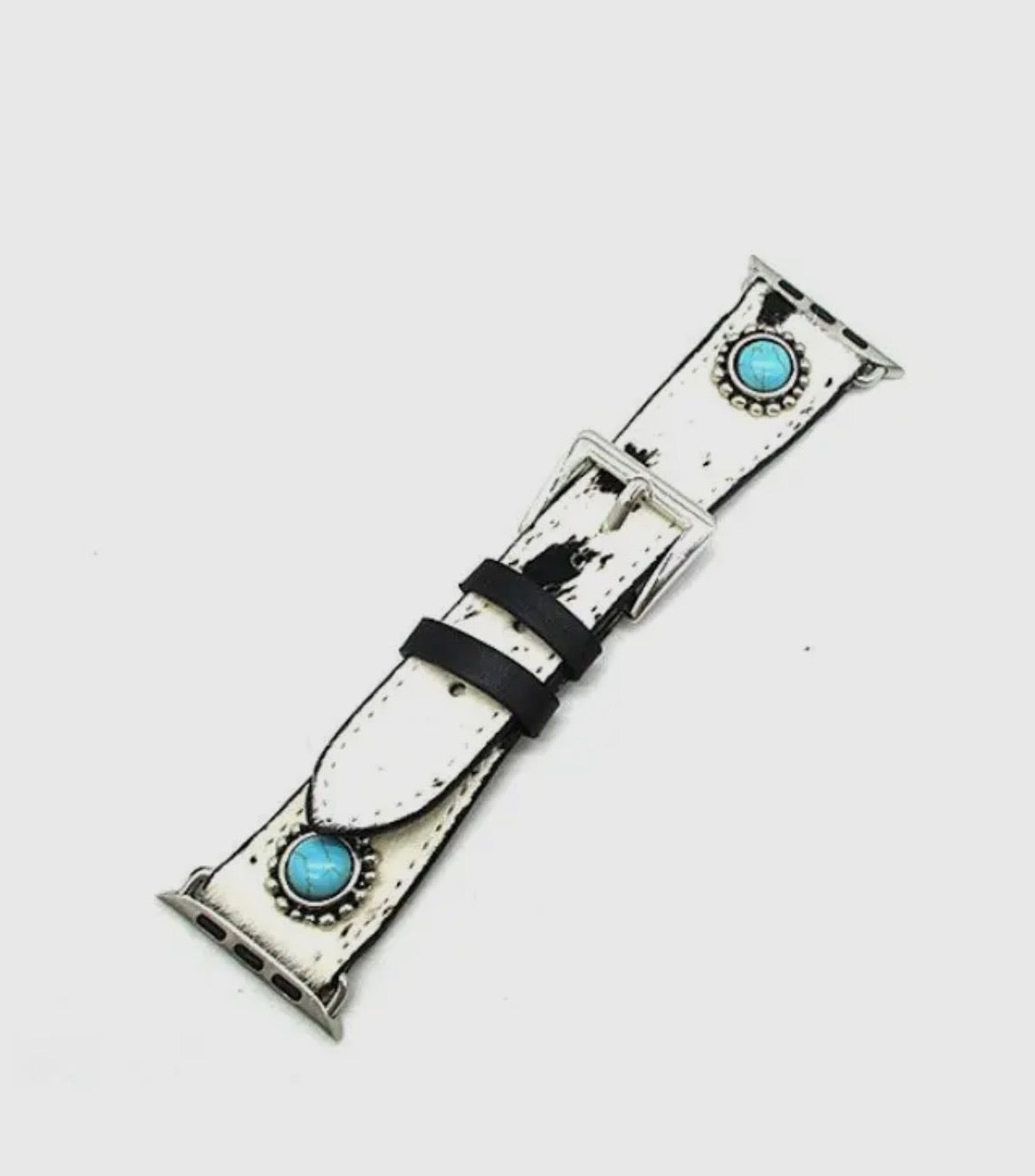Authentic texture meets elevated style. Crafted from genuine cowhide and finished with turquoise concho style accents for a look that’s equal parts rugged and feminine. No two bands are exactly alike giving each piece its own one of a kind character. Made for those who appreciate real western craftsmanship with a modern twist. Exclusive to our SSB Underground secret shop!
Fits Apple Watchband Series 3, 4, 5, 6, 7, 8, 9, 10 and SE
42mm, 44mm, and 45mm