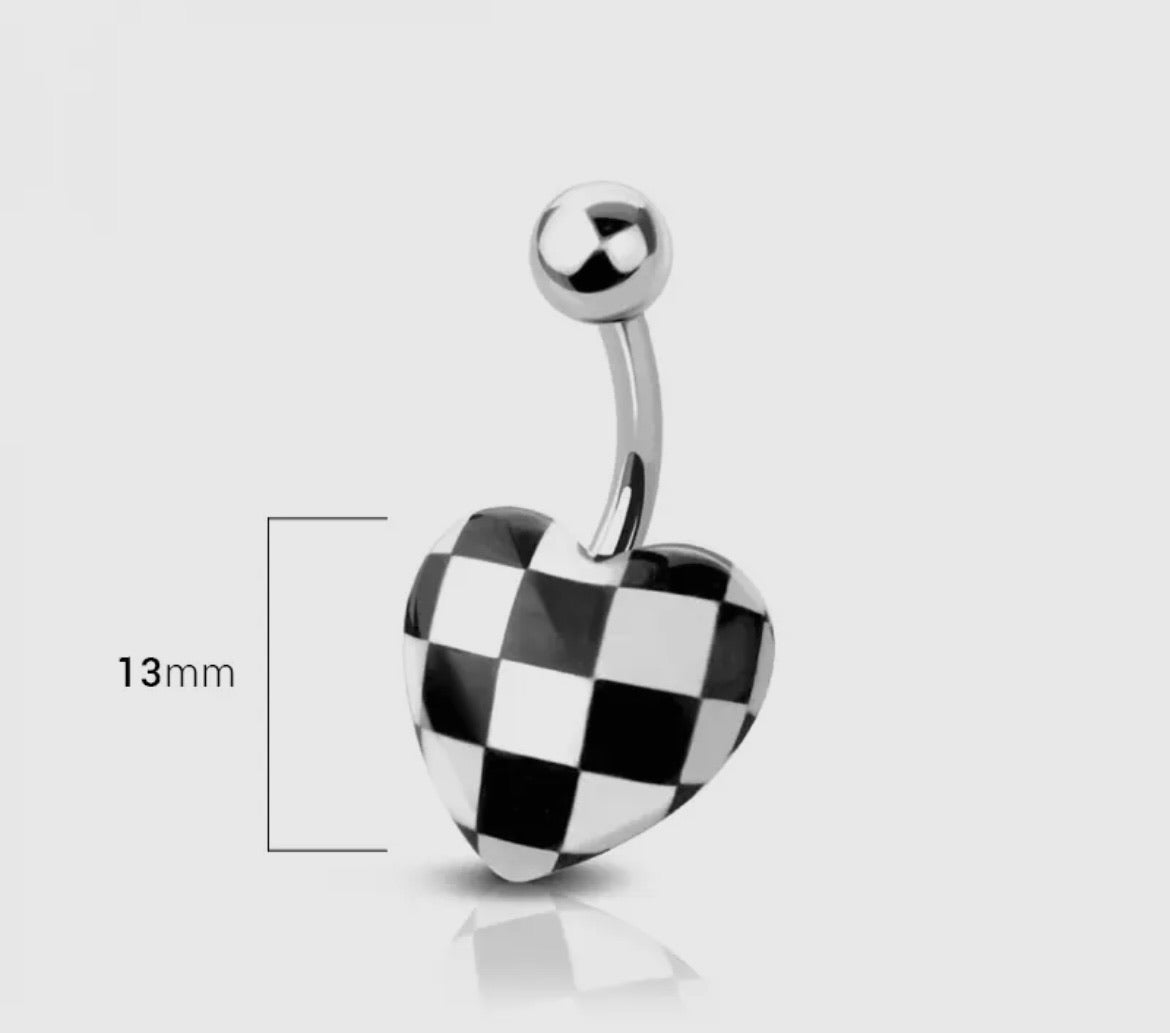 Play hard wear it louder. Featuring a bold black and white checker print heart that brings fearless energy with a flirty edge. It’s sweet in shape, edgy in style and made for babes who know when the game is already won. This is the finishing move your look didn’t know it needed. Exclusive to our SSB Underground secret shop!
Material: 316L SURGICAL
STEEL
Thickness: 14GA (1.6MM)
Length: 3/8" (10MM)
Ball Size: 5X12MM
Made in the USA
Final Sale