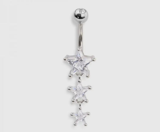 Troublemaker Twinkle belly button ring

Sweet sparkle meets rebel energy. This belly button ring is made for the girls who look innocent but stay stirring things up. From the beautiful silvertone finish to the cascading trio of crystal clear genuine CZ stars that catch the light with every move this piece serves a major main character glow from day to night. Whether you’re rocking crop tops, festival fits or just feeling extra this piece brings bold shine with underground attitude. Exclusive to our SSB Unde