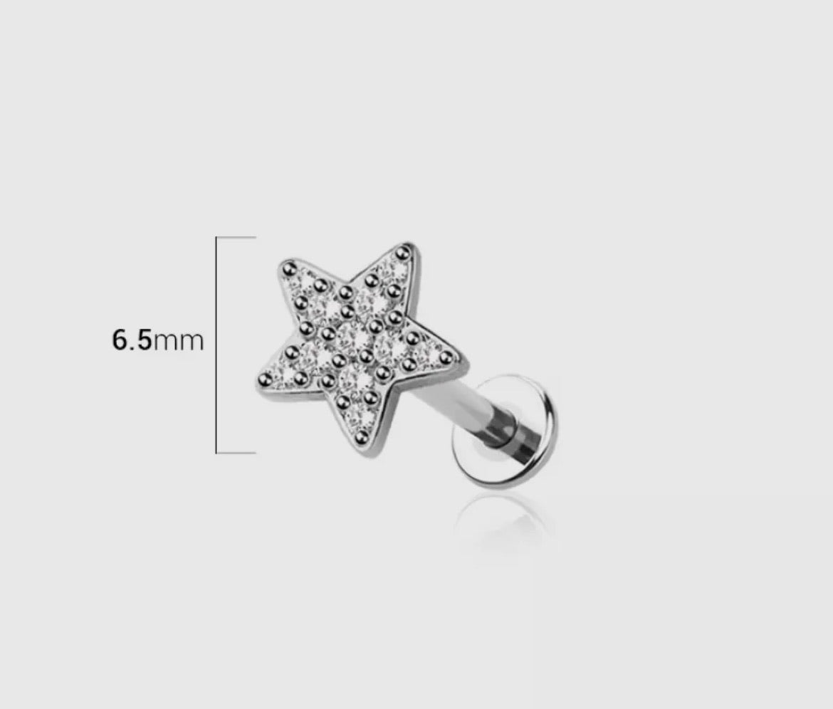 A little sparkle goes a long way. Featuring a shimmering genuine CZ star shaped design that brings just the right amount of shine without overdoing it. This one is made for those who don’t chase attention they naturally draw it. Wear it solo for a clean glow or layer it with your faves for a quiet flex that still hits. Exclusive to our SSB Underground secret shop!

Material: 316L SURGICAL STEEL/Alloy
Thickness: 16GA (1.2MM)
Length: 1/4" (6MM) or 5/16" (8MM)
Made in the USA
Final Sale

 